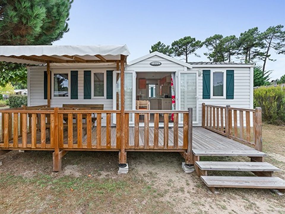 Résidence Village - Mobil home - Mobilhome 4 personnes - Mobil-home | Comfort | 2 Ch. | 4 Pers. | Terrasse surélevée | Clim.