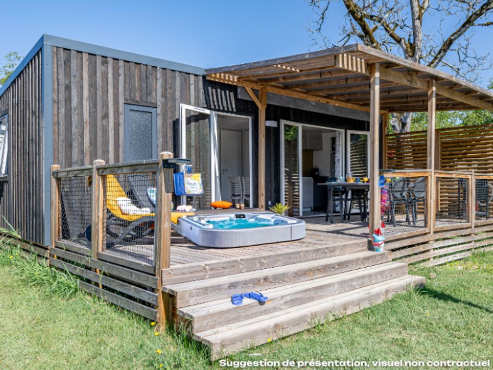 Les Paludiers - Mobil home - Mobilhome 4 personnes - Homeflower Premium 26.5m² (2 chambres) + CLIM + TV + draps + serviettes + Jacuzzi