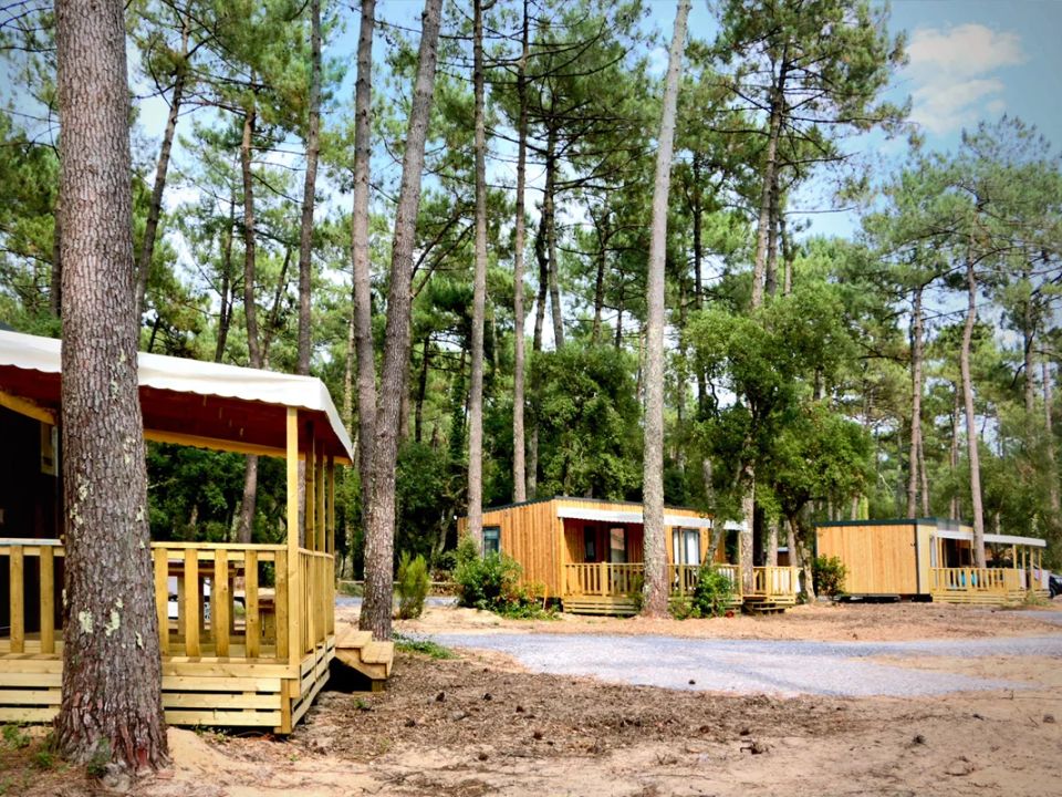 Camping du Lac - Lodge - Lodge 6 personnes - Cottage Premium TAOS 6p - 3 chambres - TV - Climatisation Camping du Lac - Lodge - Lodge 6 personnes - Cottage Premium TAOS 6p - 3 chambres - TV - Climatisation