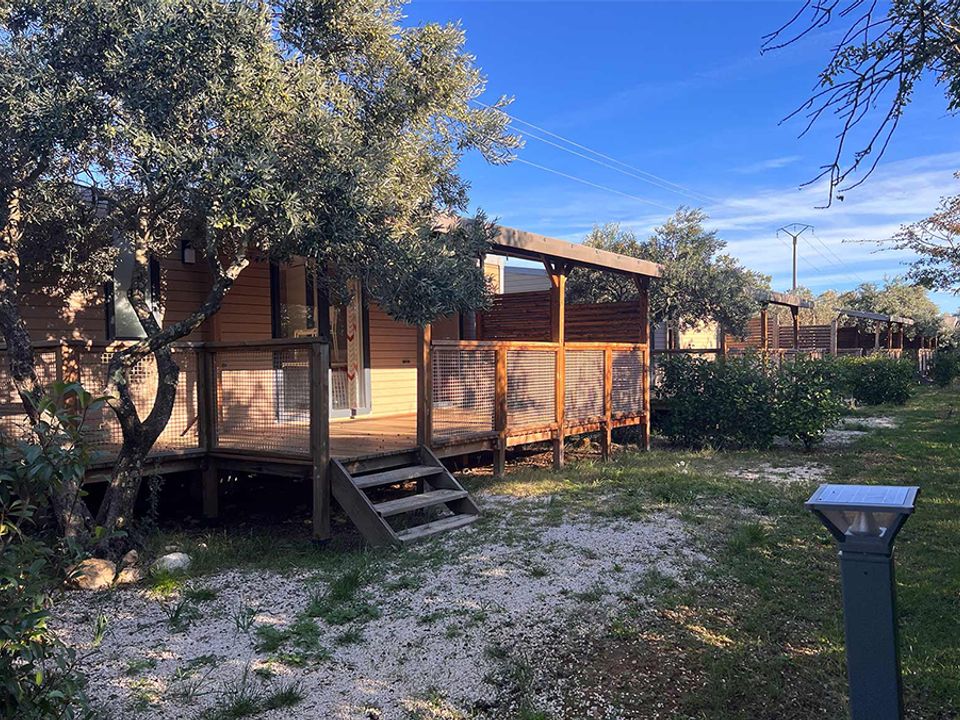 International Camping - Mobil home - Mobilhome 4 personnes - Mobil home Castellane côté jardin - 30m² - 2 chambres + TV + A/C