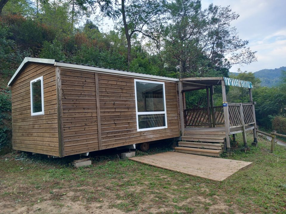 Mas de Champel - Mobil home - Mobilhome 4 personnes - Mobile-Home 30m² - Standard - 2 chambres - terrasse semi-couverte - TV - Clim 4 pers.